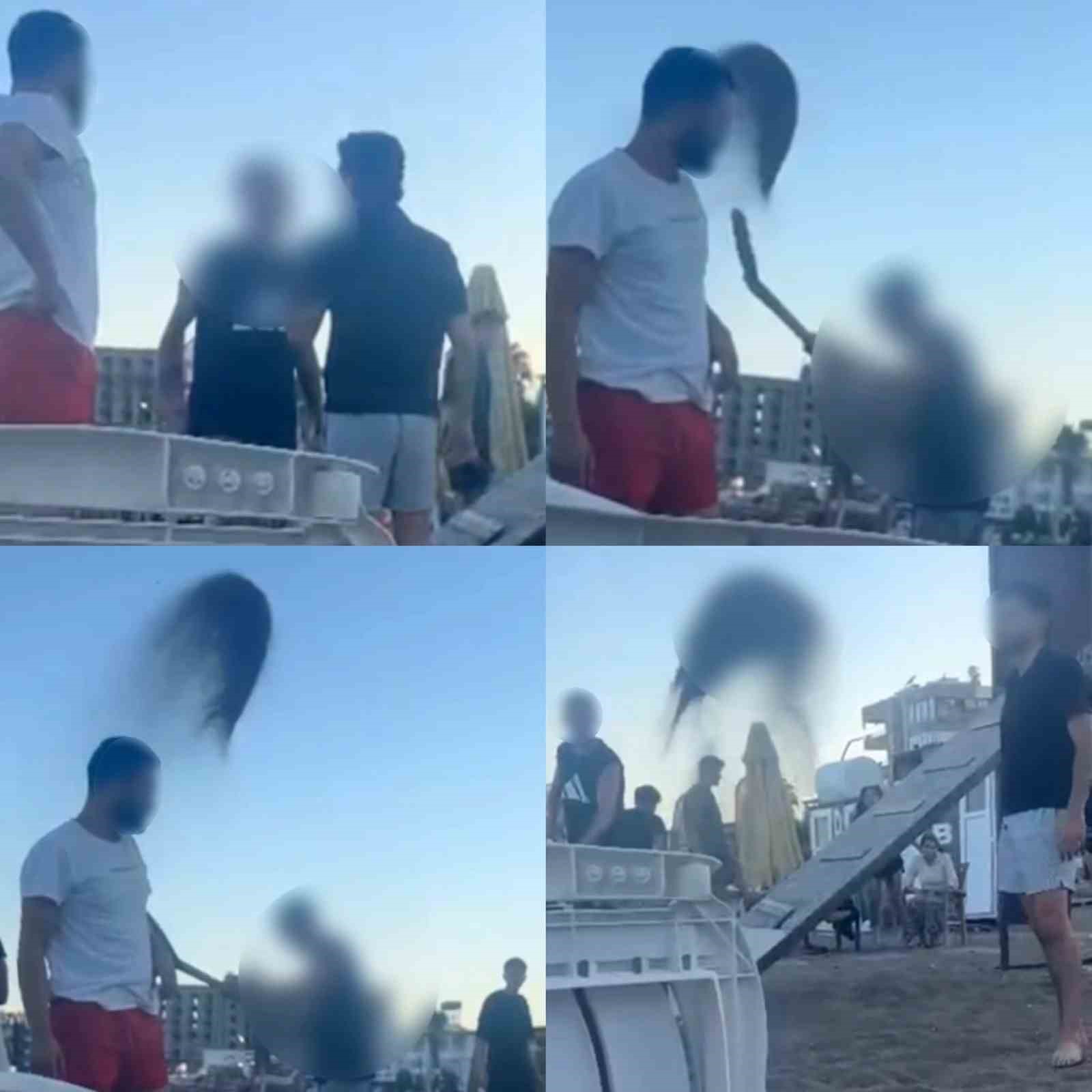 Plajdan kaldırılmak istenen gen&ccedil;lere kum fırlatıldı: 2 g&ouml;zaltı